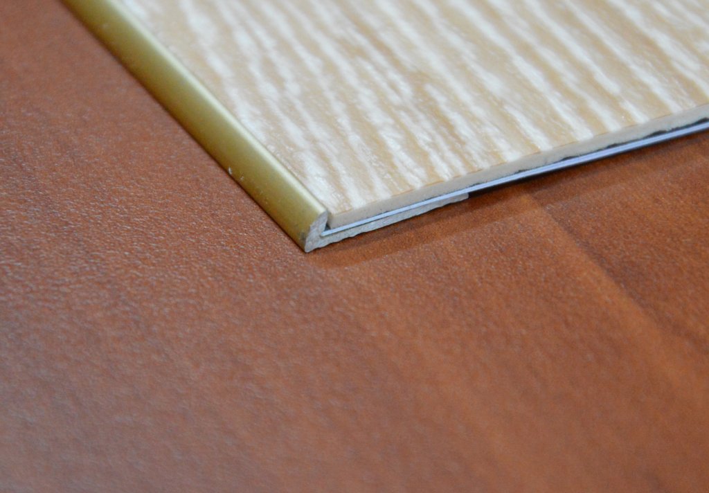 Přechodové lišty Profilteam ukončovací pro vinyl a PVC